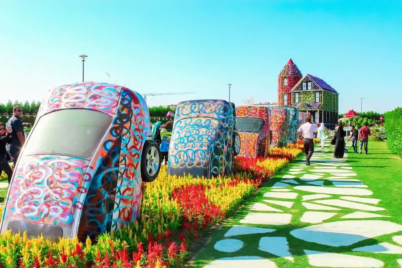 Dubai Miracle Garden: Your Quick Guide | Points of Attractions in Dubai Miracle Garden | Half-Buried Cars | The Vacation Builder